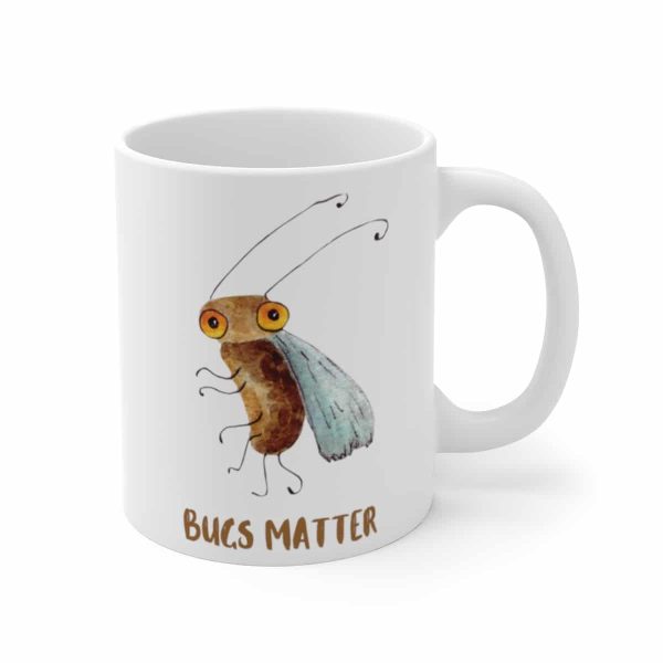 White ceramig coffee mug with a watercolor painting of a whimsical fruit fly