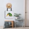 white polyester tote bag featuring a watercolor illustration of a whimsical crow the bag is hanging in a hall